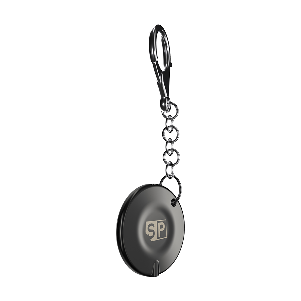 340007_Target_Swiss_Point_Key_Premium_2 Das Bild zeigt den "Target Swiss Point Key Premium", einen runden Schlüsselanhänger mit Kette und Karabinerhaken. Auf der Vorderseite ist ein "SP"-Logo sichtbar.