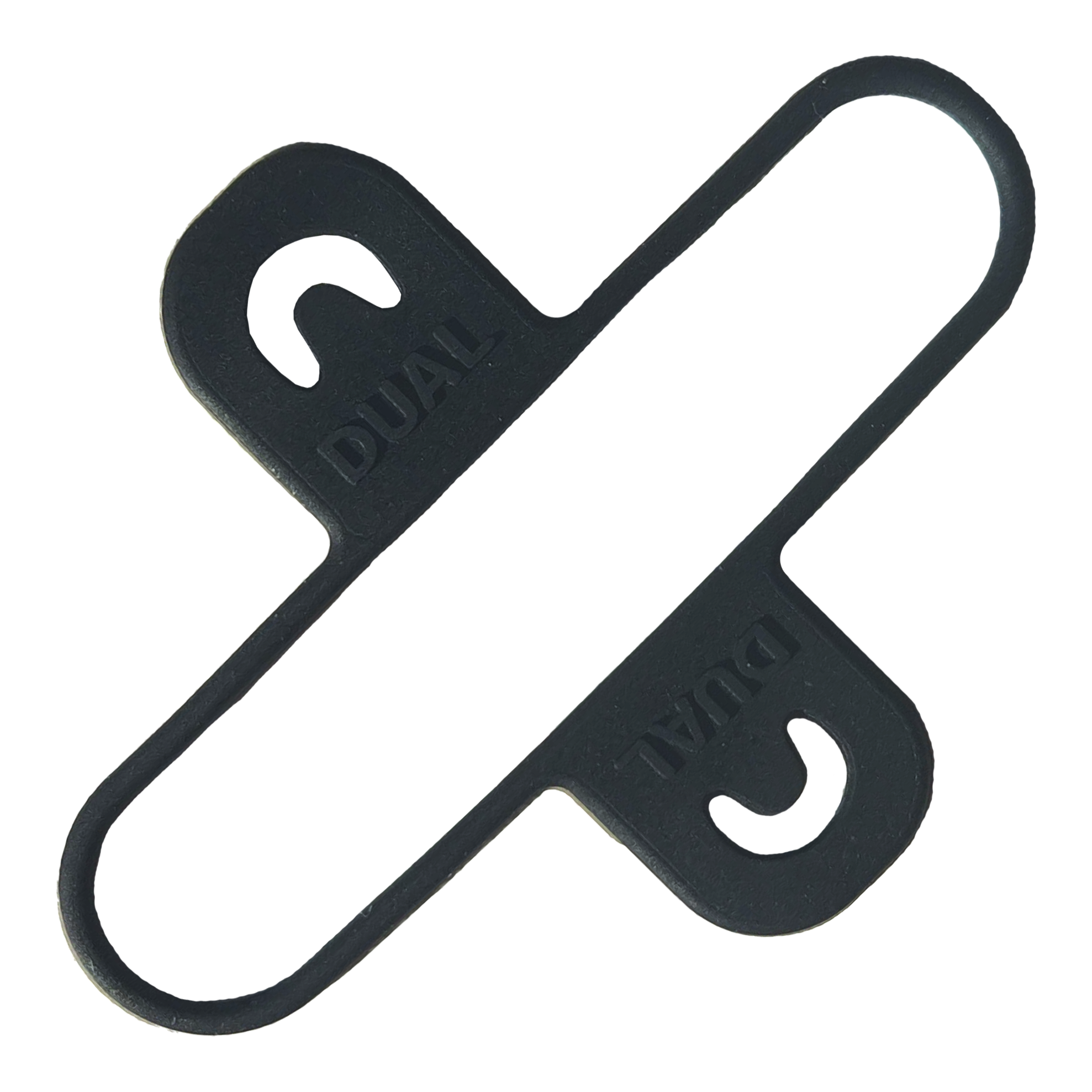 Das Bild zeigt ein schwarzes Kunststoffteil mit der Aufschrift "DUAL". Es handelt sich um einen Teil des Condor Dual Dartcase Belt 3-er Sets.