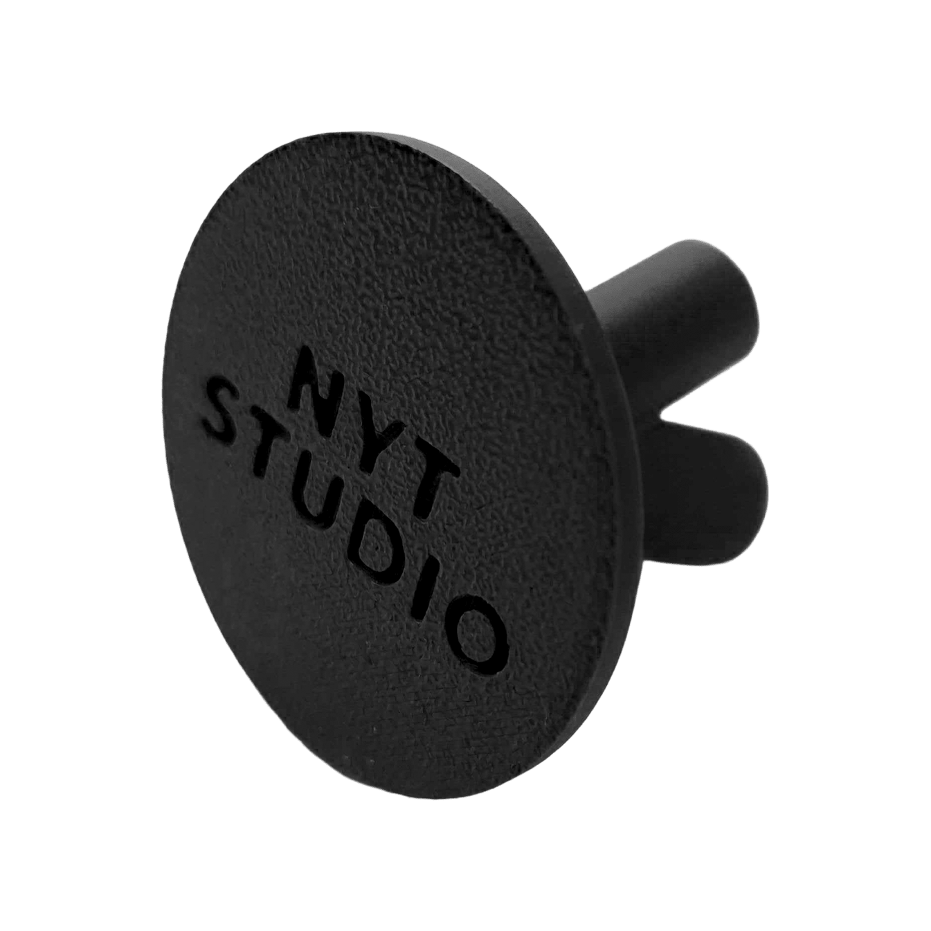 Kompaktní držák šipek NYT Studio Das Bild zeigt einen schwarzen, kompakten Dart-Halter. Es handelt sich um den NYTStudio Compact Darts Halter.