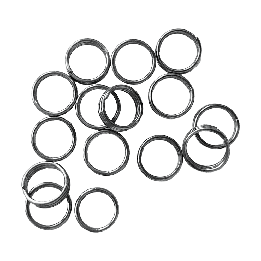 McDart Shaftringe - 5 Sets Auf dem Bild sind mehrere silberne Ringe zu sehen, die sogenannten McDart Shaftringe. Es handelt sich dabei um 5 Sets, die als Zubehör für Dartpfeile verwendet werden.