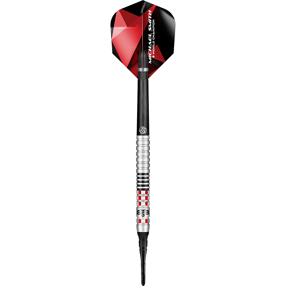 Šipky Shot Michael Smith Achieve Soft Auf dem Bild ist ein Softdartpfeil mit silbernen und schwarzen Elementen zu sehen. Das Flights ist rot-schwarz und trägt die Aufschrift "Michael Smith World Champion".