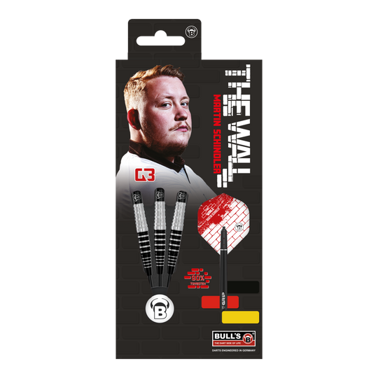 Ocelové šipky Bulls Martin Schindler Original Generation 3 Auf dem Bild ist die Verpackung der "Bulls Martin Schindler Original Generation 3 Steeldarts" zu sehen. Auf der Verpackung sind ein Porträt von Martin Schindler und drei Steeldarts abgebildet.