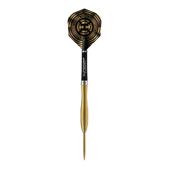 Harrows Anniversary Edition V-Wing Steel Darts Dies ist ein goldfarbener Steeldart mit einer schwarzen und goldenen Flight. Auf dem Flight steht „Harrows Anniversary Edition“ und andere Beschriftungen in goldener Farbe.