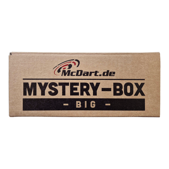 Auf dem Bild ist eine große braune Box mit der Aufschrift "McDart.de Mystery-Box - Big" zu sehen. Die Verpackung wirkt geheimnisvoll und verspricht eine Überraschung.