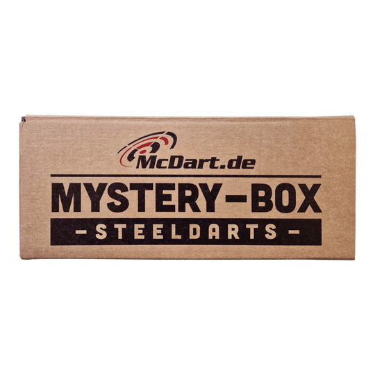 McDartova záhadná krabička - Steeldarts Die Abbildung zeigt eine braune Box mit der Aufschrift „McDart Mystery-Box - Steeldarts“. Die Verpackung sieht einfach aus und ist speziell für Steeldarts-Fans gestaltet.