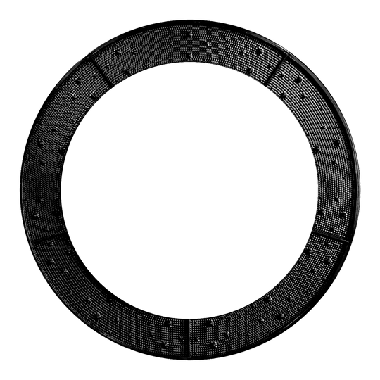 Das Bild zeigt einen schwarzen, ringförmigen Wurfkranz mit sichtbaren Noppen auf der Oberfläche. Der Ring ist in mehrere Segmente unterteilt.
