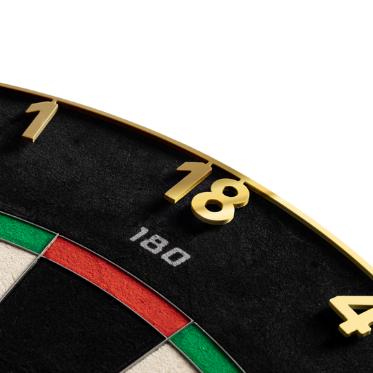 Precise 180 Endorphine Steel Dartboard s číslovaným kroužkem - zlatý Hier sieht man das Precise 180 Endorphine Steeldartboard mit Nummernring in Gold. Die goldene Dartscheibe ist für präzises Spielen konzipiert.
